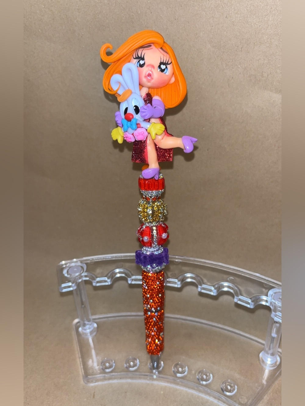 Cute Orange Glitter Doll Pen with Purple Accents -